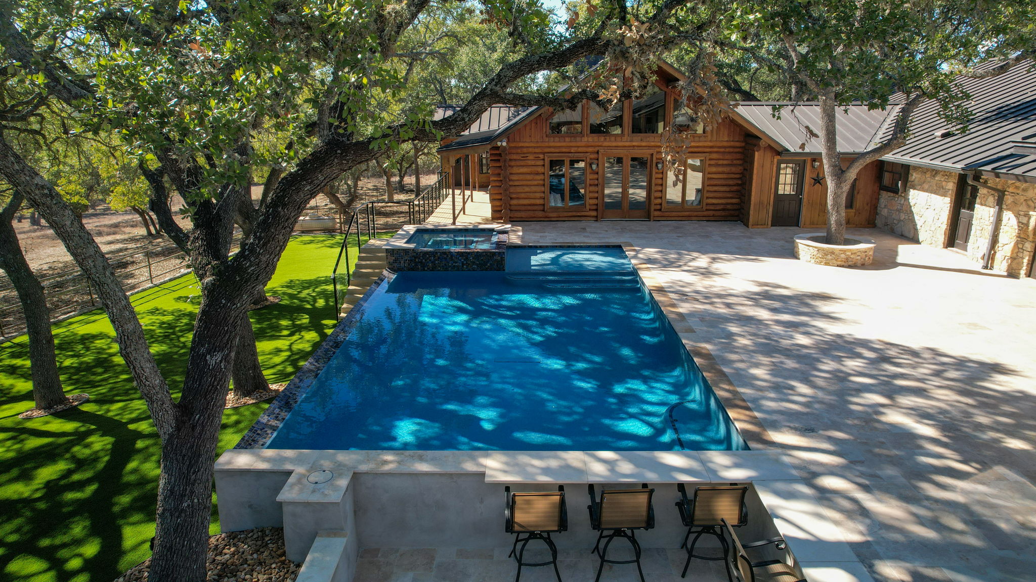 Aerial view of completed pool and outdoor living