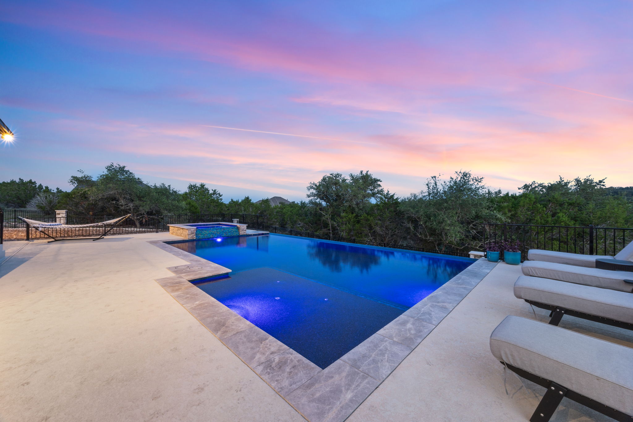 Pool with modern water features and clean lines